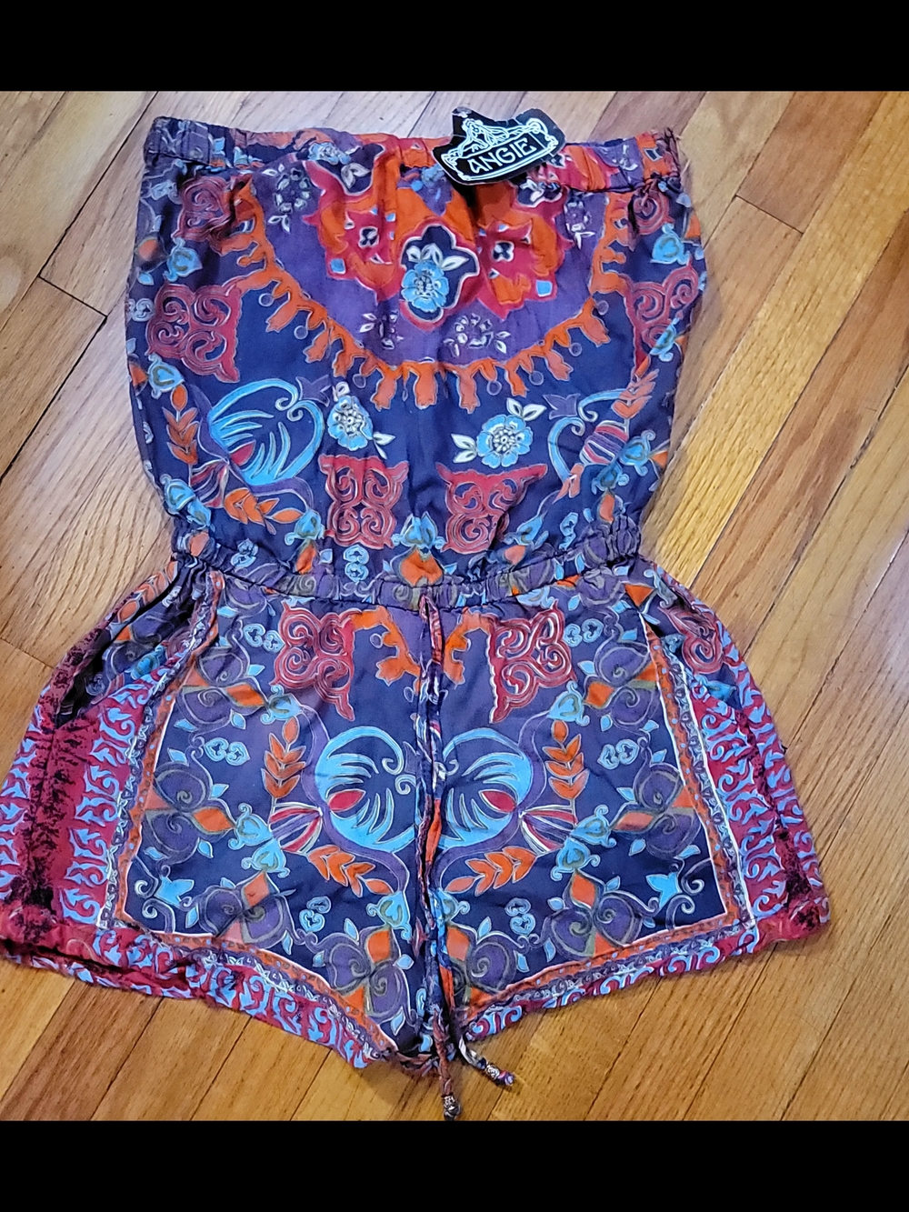 Angie Floral Print Strapless Romper in Purple and Orange